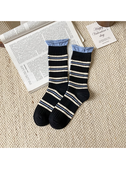 Black ribbed crew socks with ivory and light blue stripes