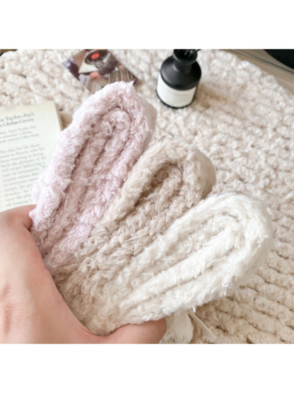 Close-up of the fuzzy upper openings in pink, beige and ivory