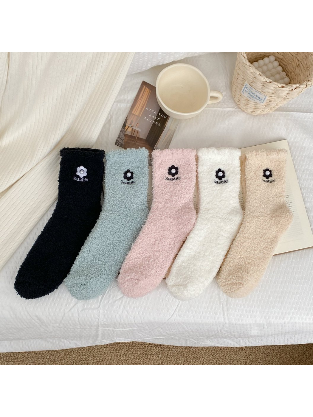 Five colors of fuzzy crew socks displayed together