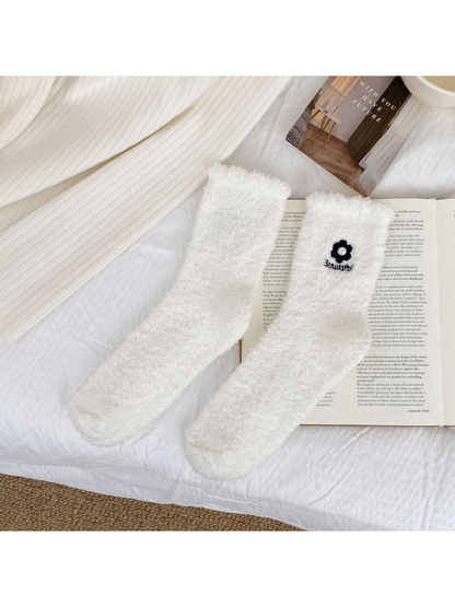 White fuzzy crew socks with flower embroidery