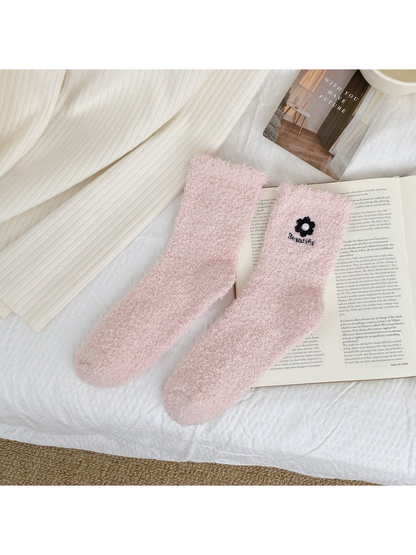 Light pink fuzzy crew socks with flower embroidery