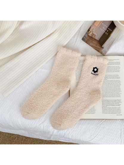 Pale beige fuzzy crew socks with flower embroidery