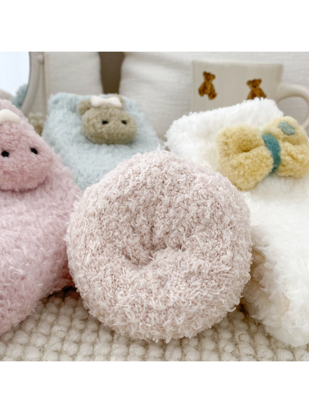 Close-up of a rolled fuzzy sock cuff and decorative appliques