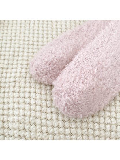 Close-up of the rounded toes and fuzzy sock texture
