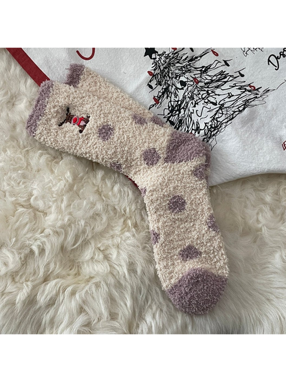 Cream fuzzy socks with purple dots and embroidered reindeer