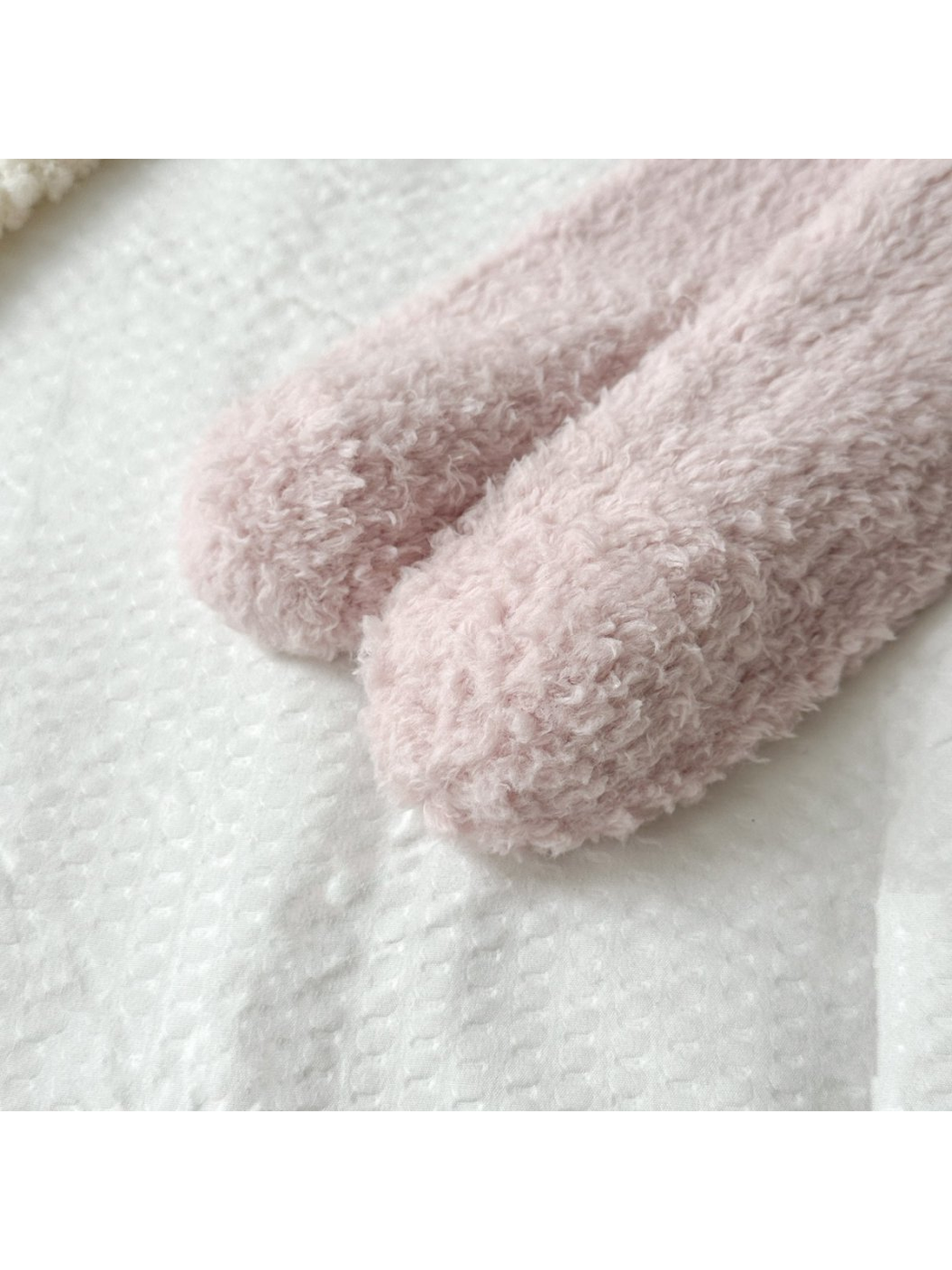 Close-up of the rounded toe and dense fuzzy texture