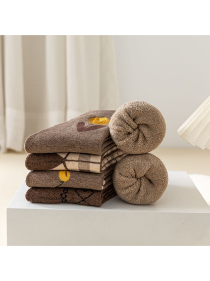 Folded and rolled socks showing the fuzzy interior surface