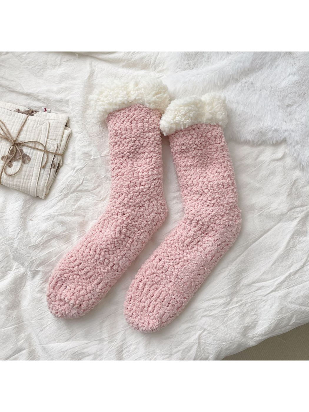 Light pink fuzzy crew socks with contrasting ivory folded cuffs
