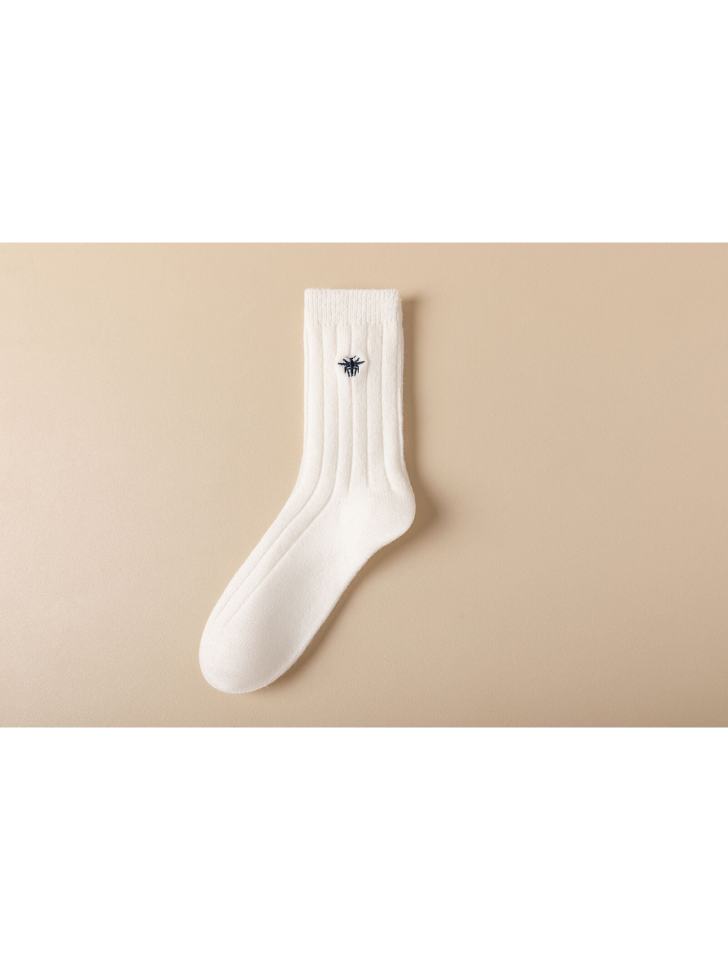 White ribbed crew sock with dark embroidered insect motif