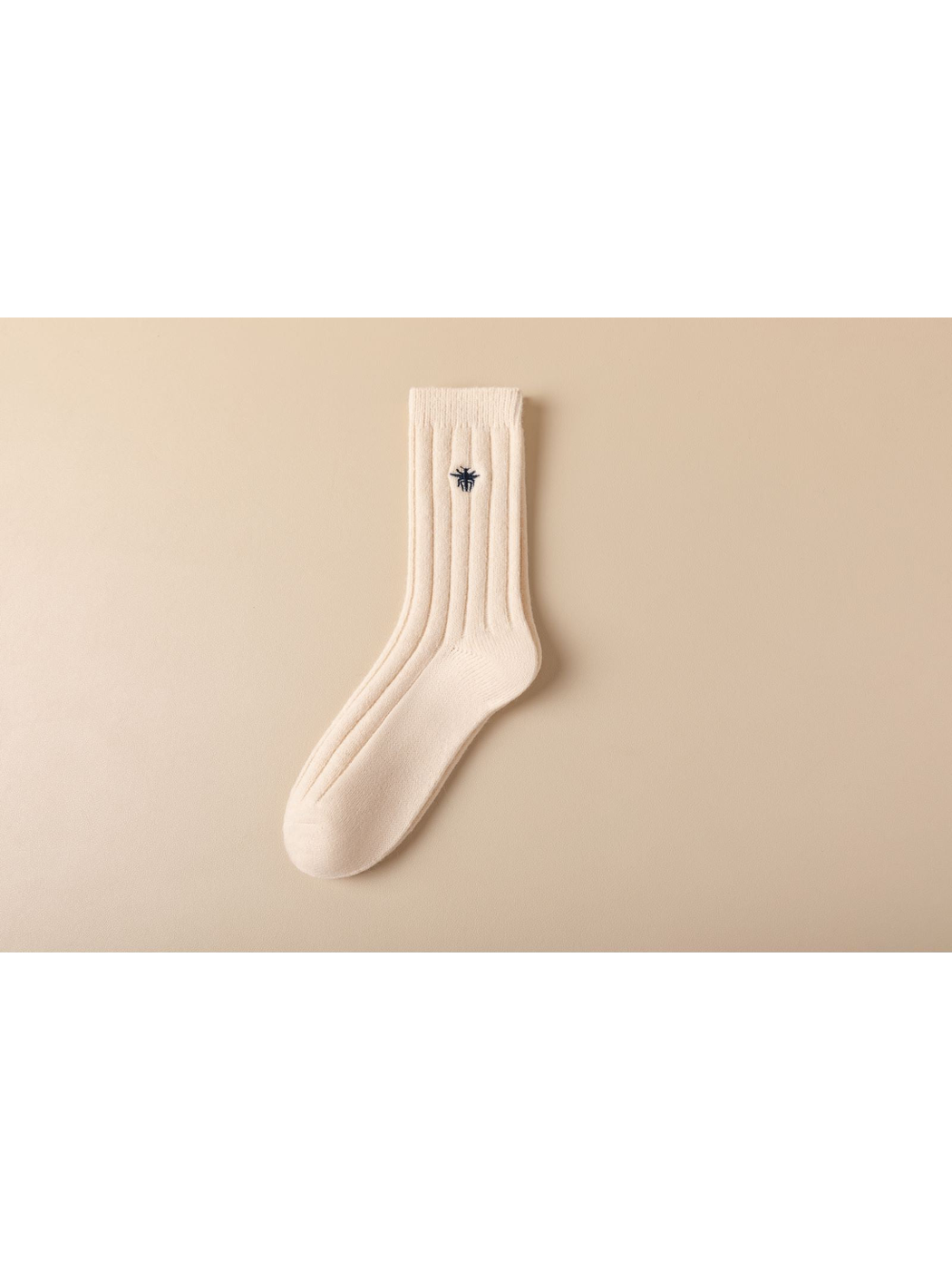 Ivory ribbed crew sock with dark embroidered insect motif