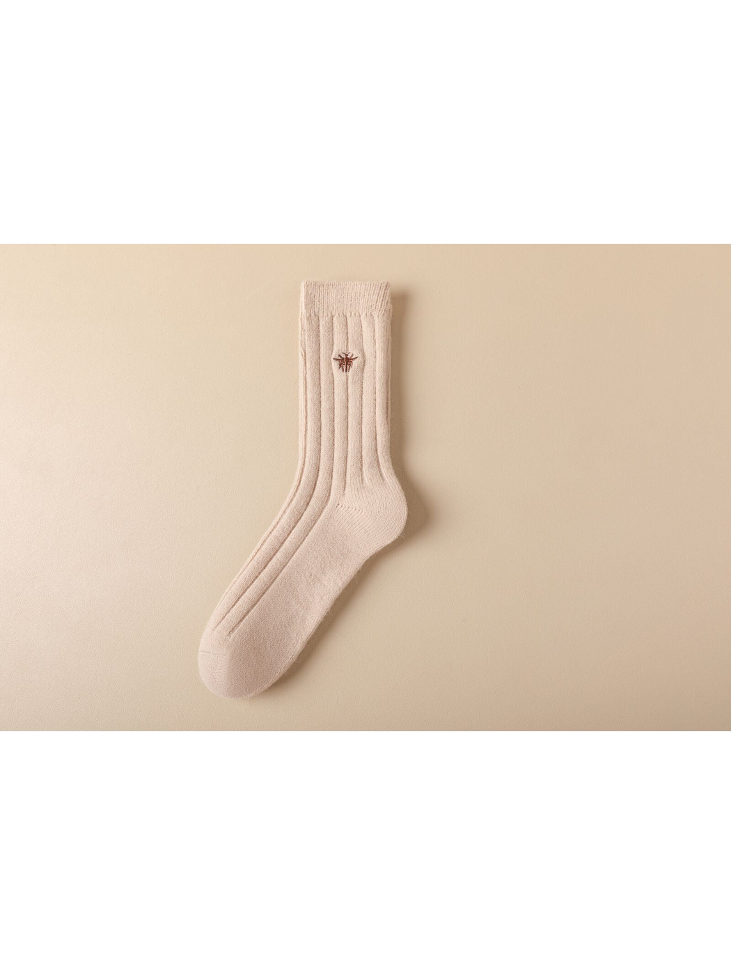 Light beige ribbed crew sock with brown embroidered insect motif