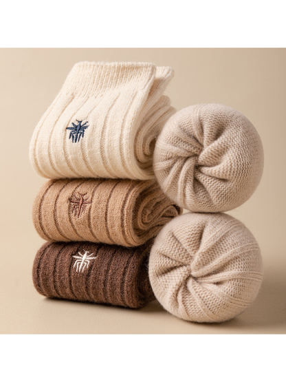 Neutral-tone ribbed socks displayed folded and rolled