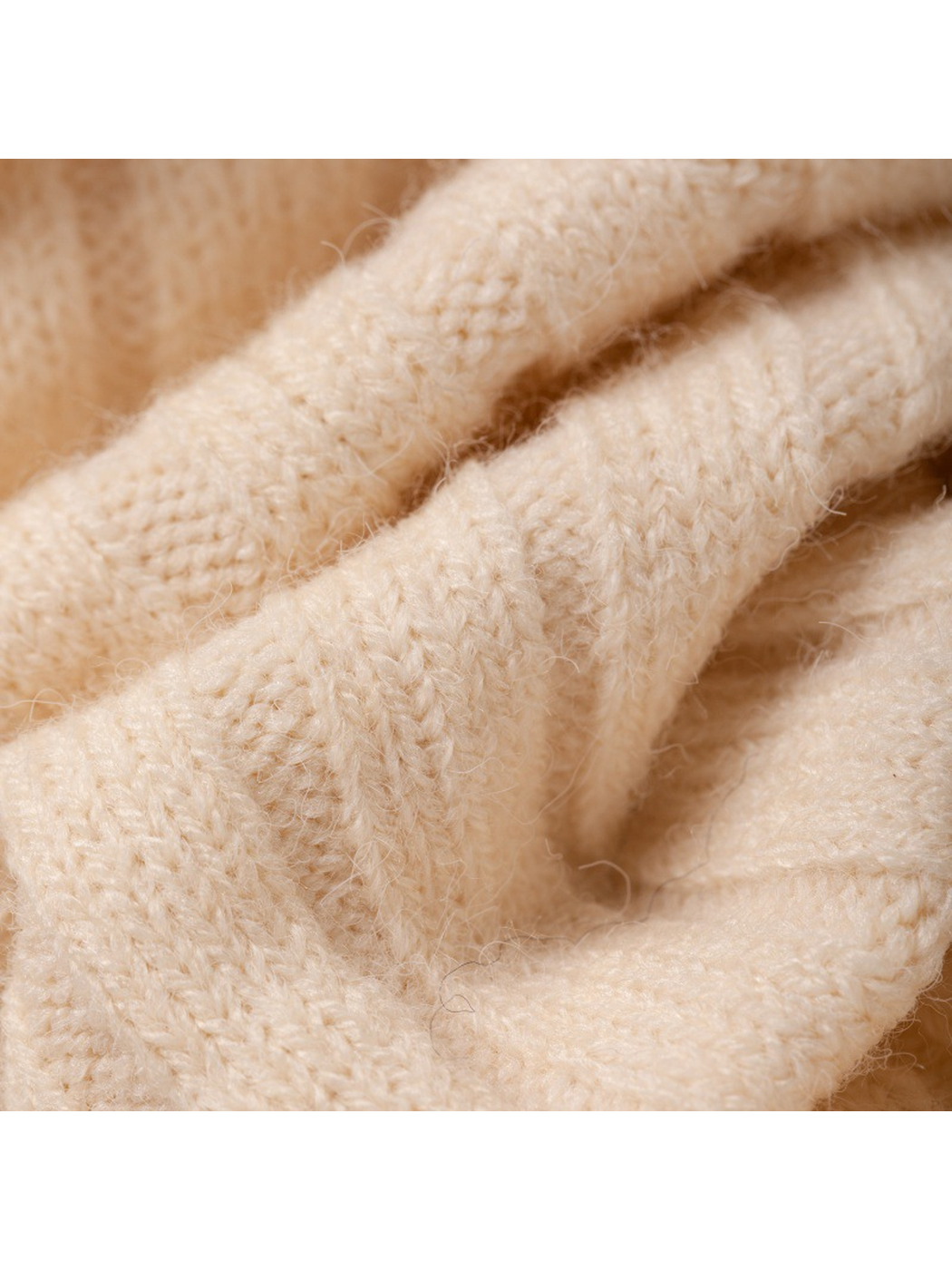 Macro close-up of the fine raised fibers and knit texture