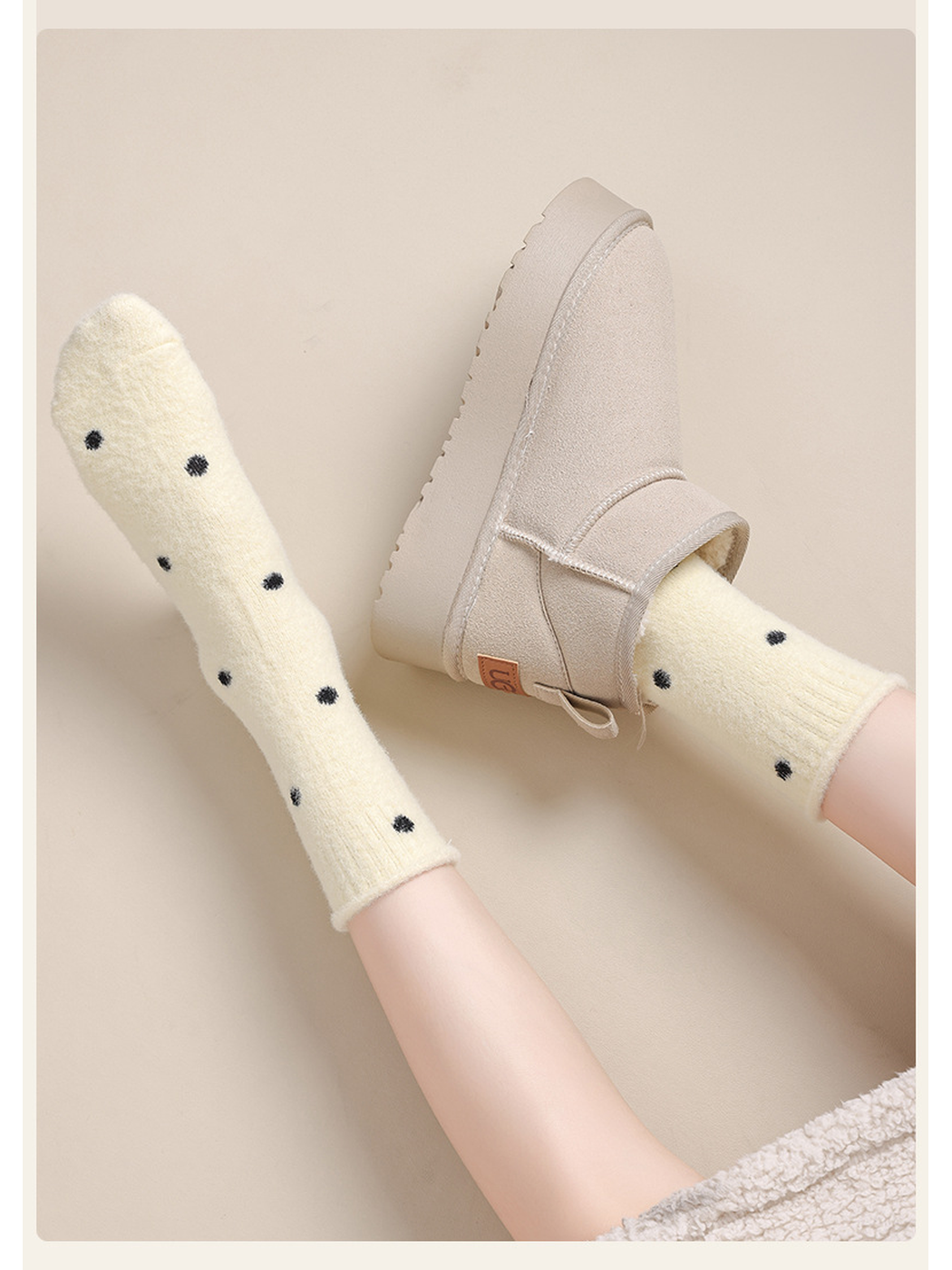 Pale yellow polka-dot crew socks styled with an ankle boot