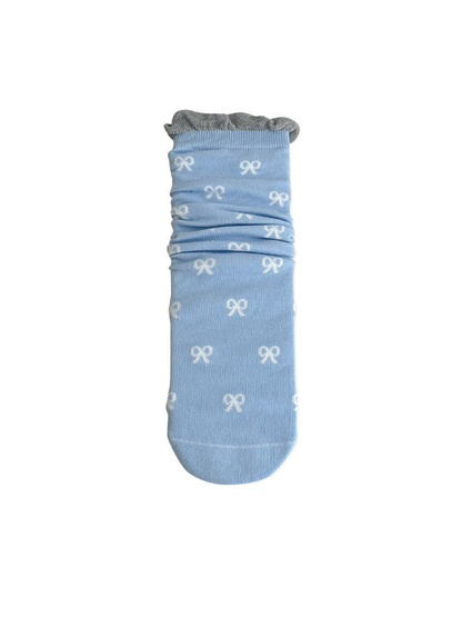 Light blue bow-pattern crew sock with a gray ruffled cuff