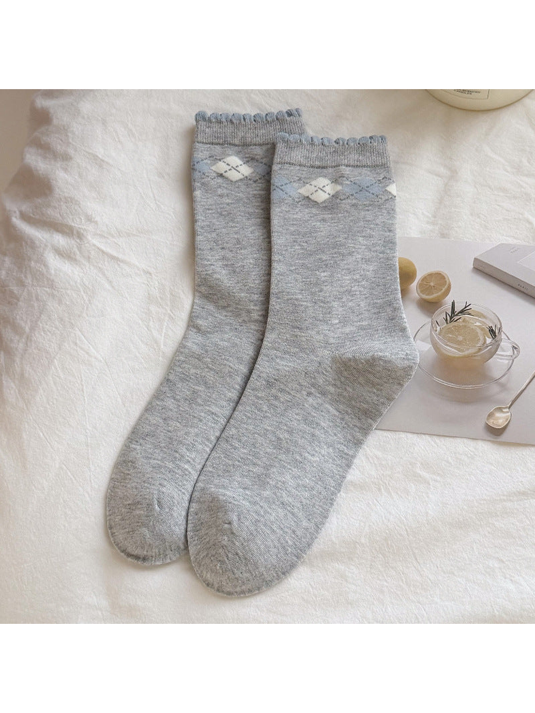Light gray crew socks with blue and ivory argyle bands