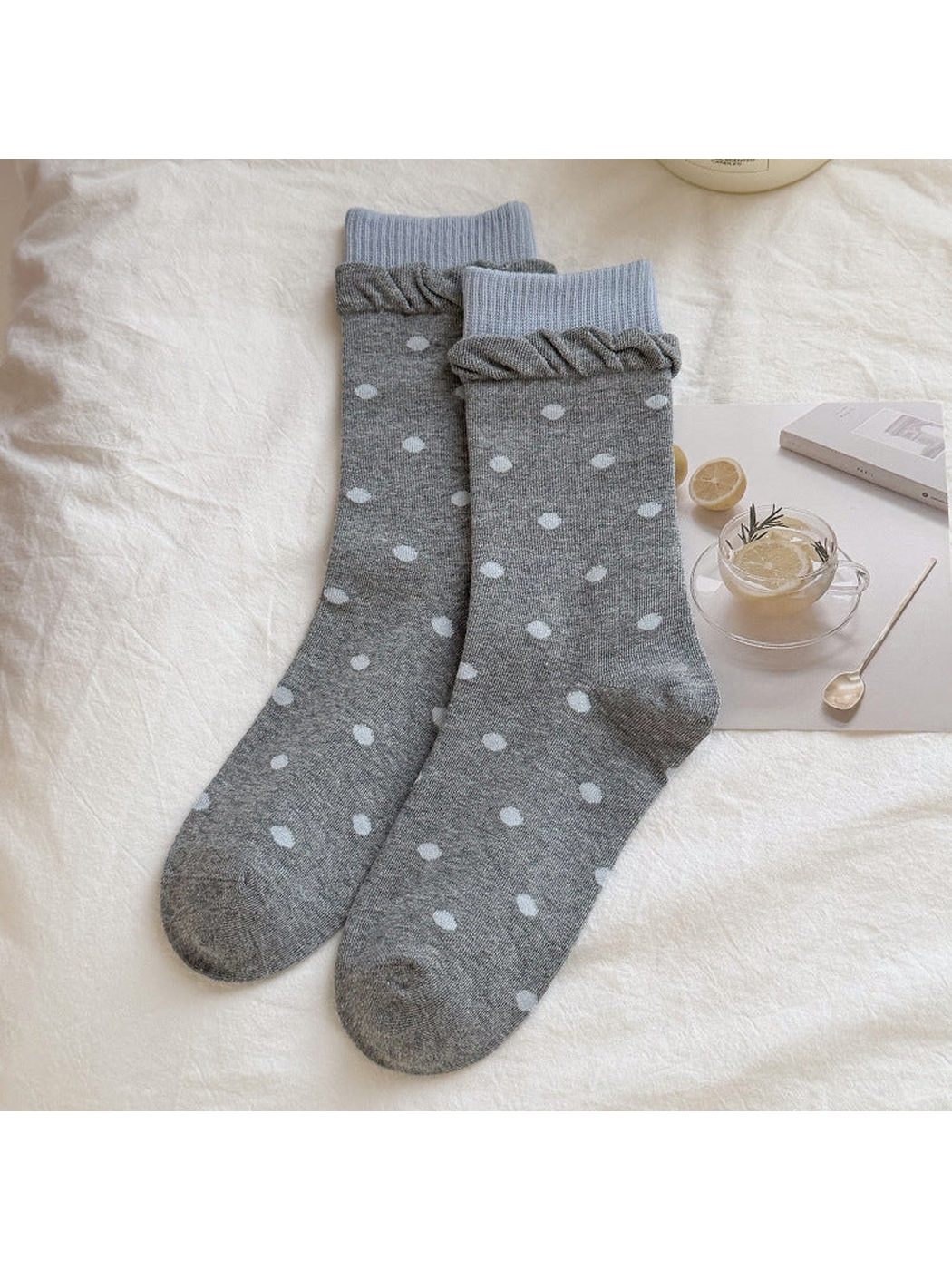 Gray polka-dot crew socks with layered blue and gray cuffs