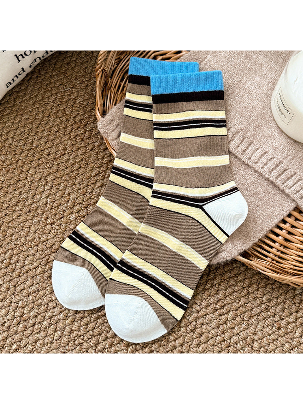Blue and brown striped crew socks with bright blue cuffs