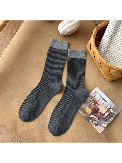 Dark gray ribbed crew socks with light gray cuffs