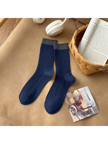 Navy ribbed crew socks with dark gray cuffs