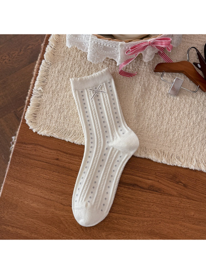 White crew sock with dotted ribbing and ribbon bow