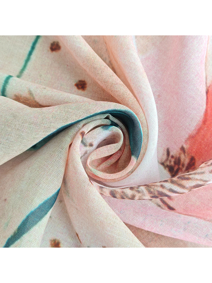Close-up of the scarf's fine woven-look texture and pale printed folds