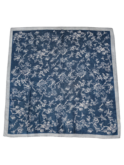 Navy blue square scarf with white floral, bird and butterfly motifs and a striped border