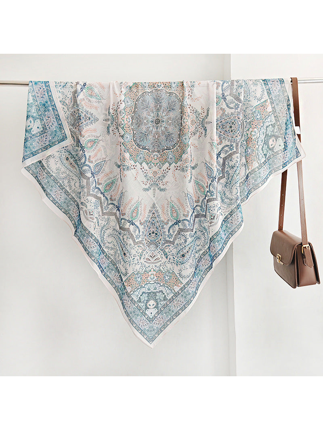 Blue square scarf with paisley motifs, central medallion and decorative border