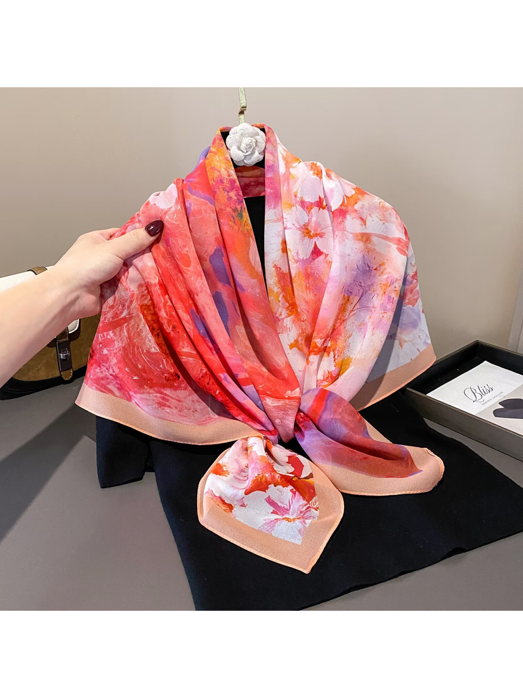 Multicolor abstract floral scarf styled in a front knot