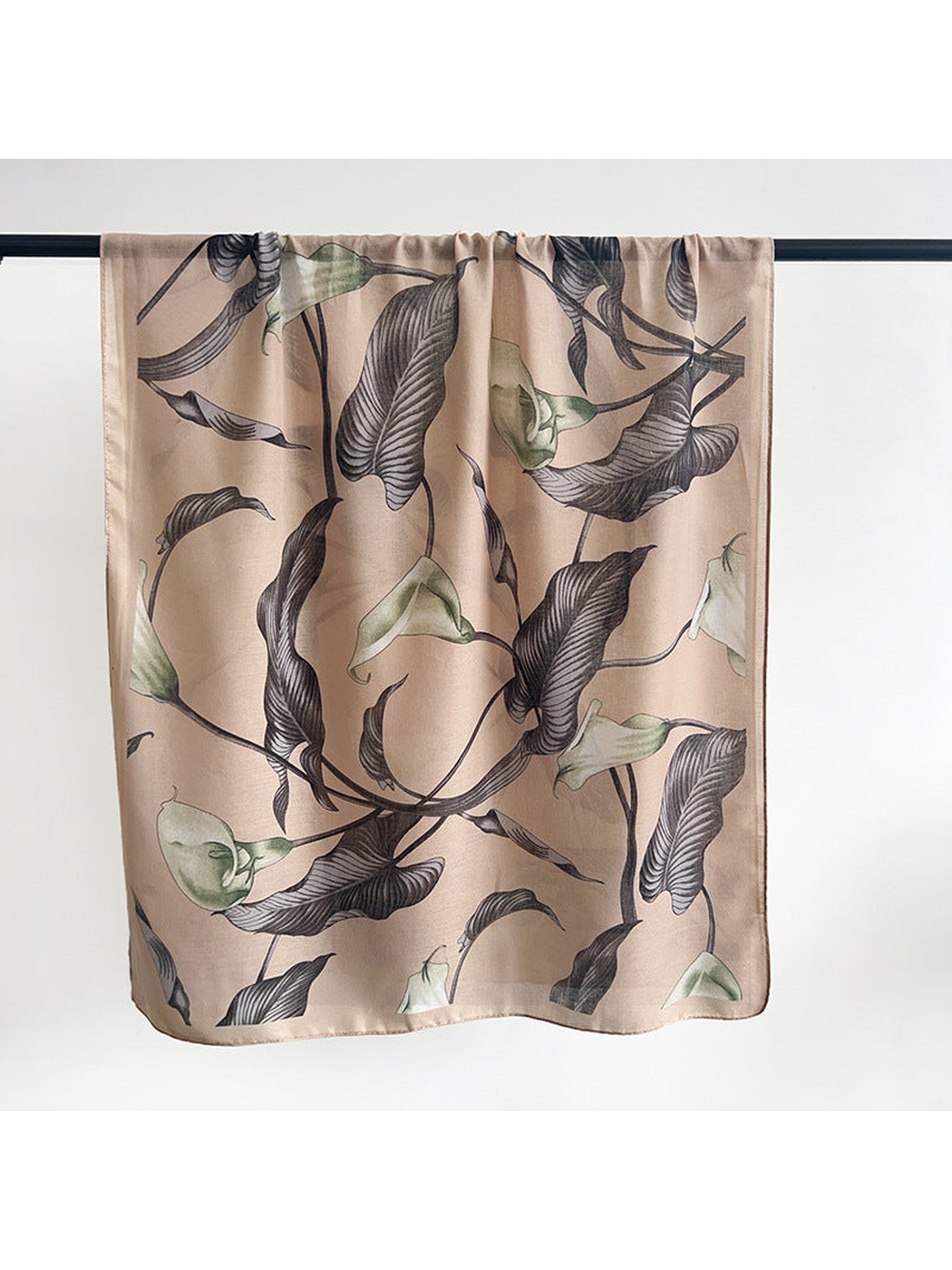 Beige scarf with charcoal leaves and pale green flowers