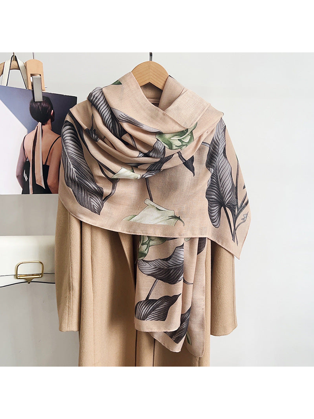 Beige floral scarf styled over a neutral coat
