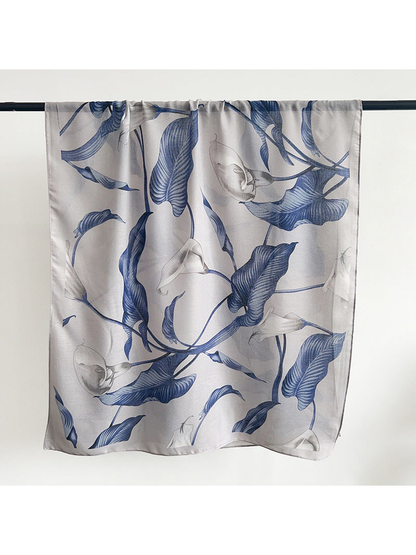 Gray-blue scarf with blue leaves and pale flowers