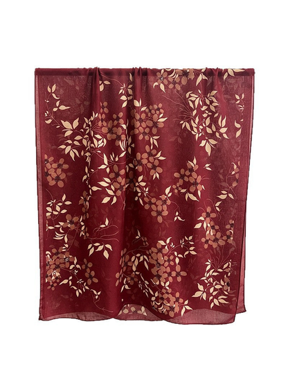 Burgundy rectangular scarf with an allover floral and leaf pattern