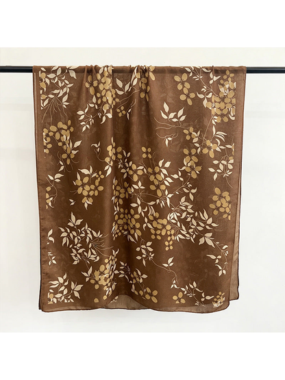 Brown floral and leaf patterned rectangular scarf