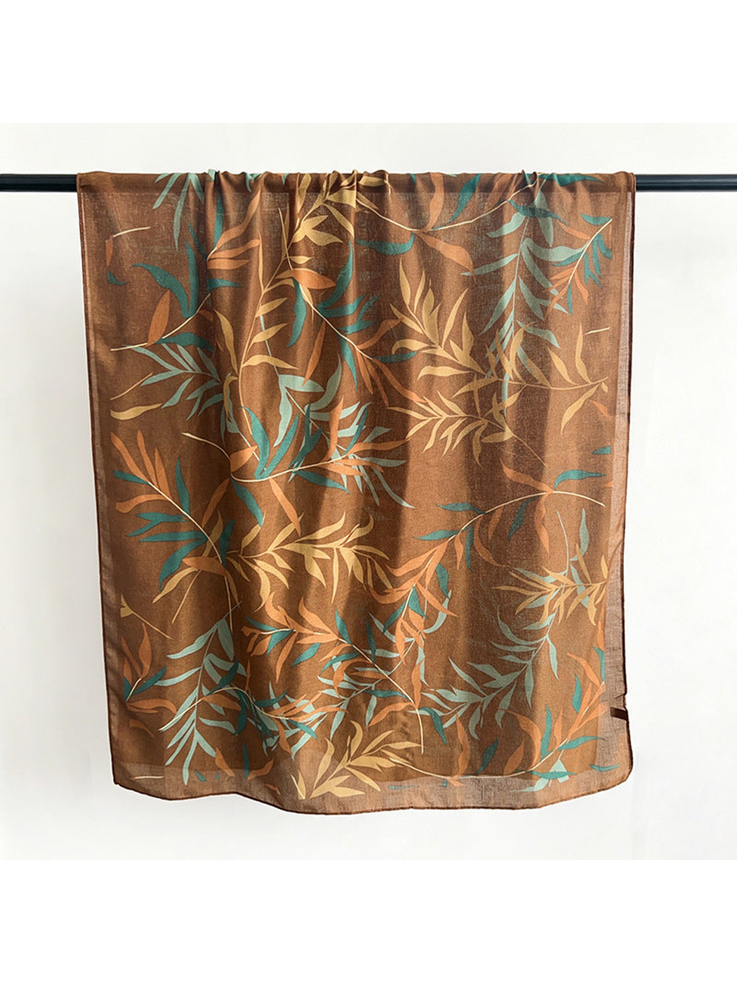 Caramel rectangular scarf with teal and tan leafy branches