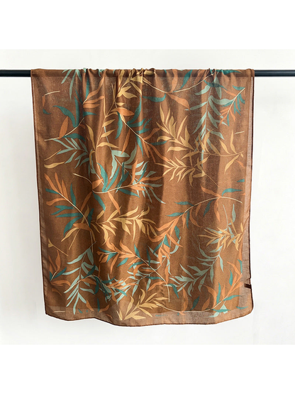 Caramel rectangular scarf with teal and tan leafy branches