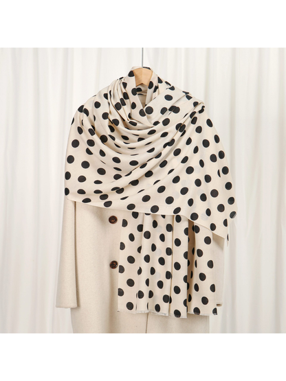 Ivory scarf with black polka dots, draped front view