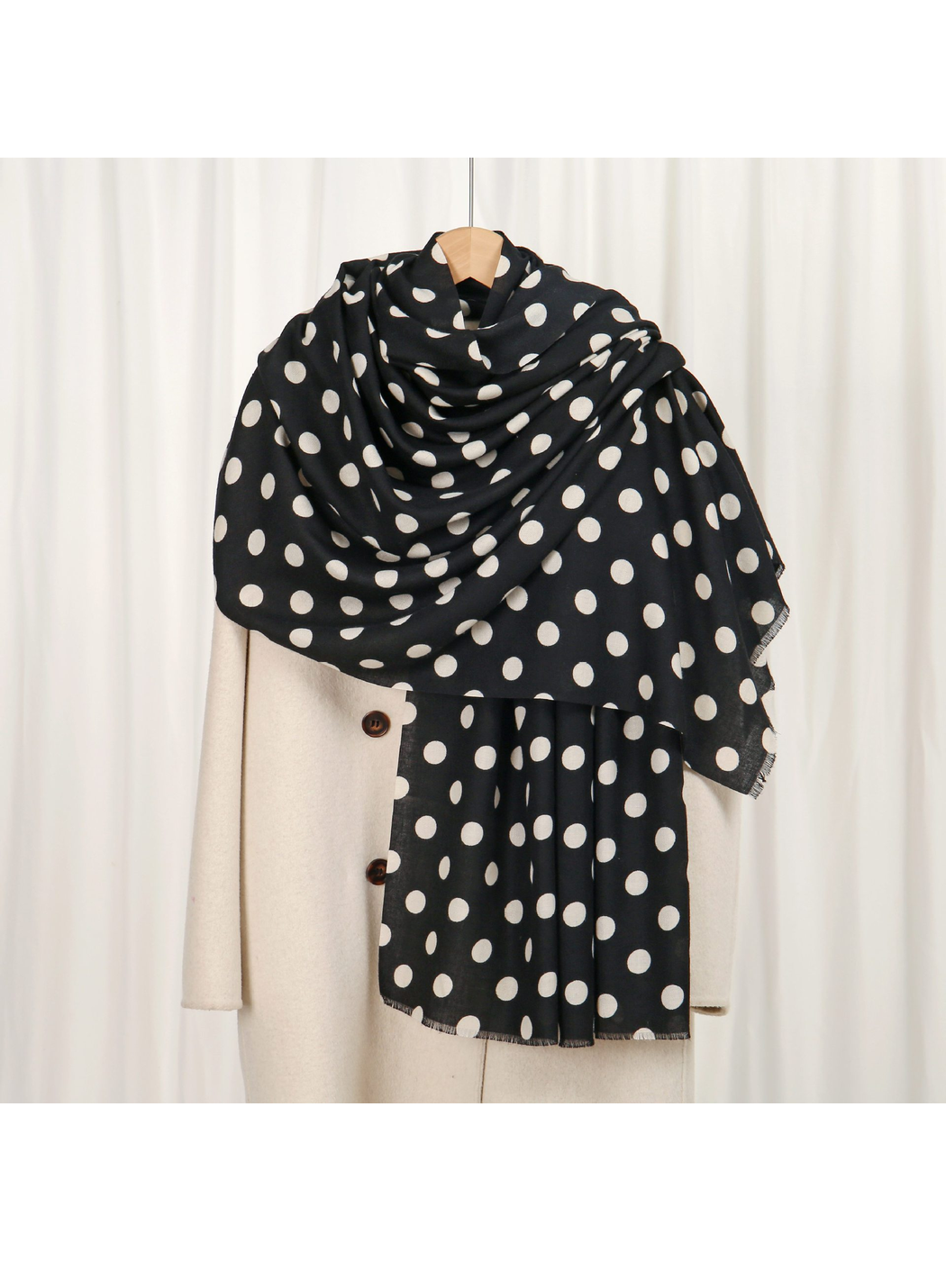Black scarf with ivory polka dots, draped front view