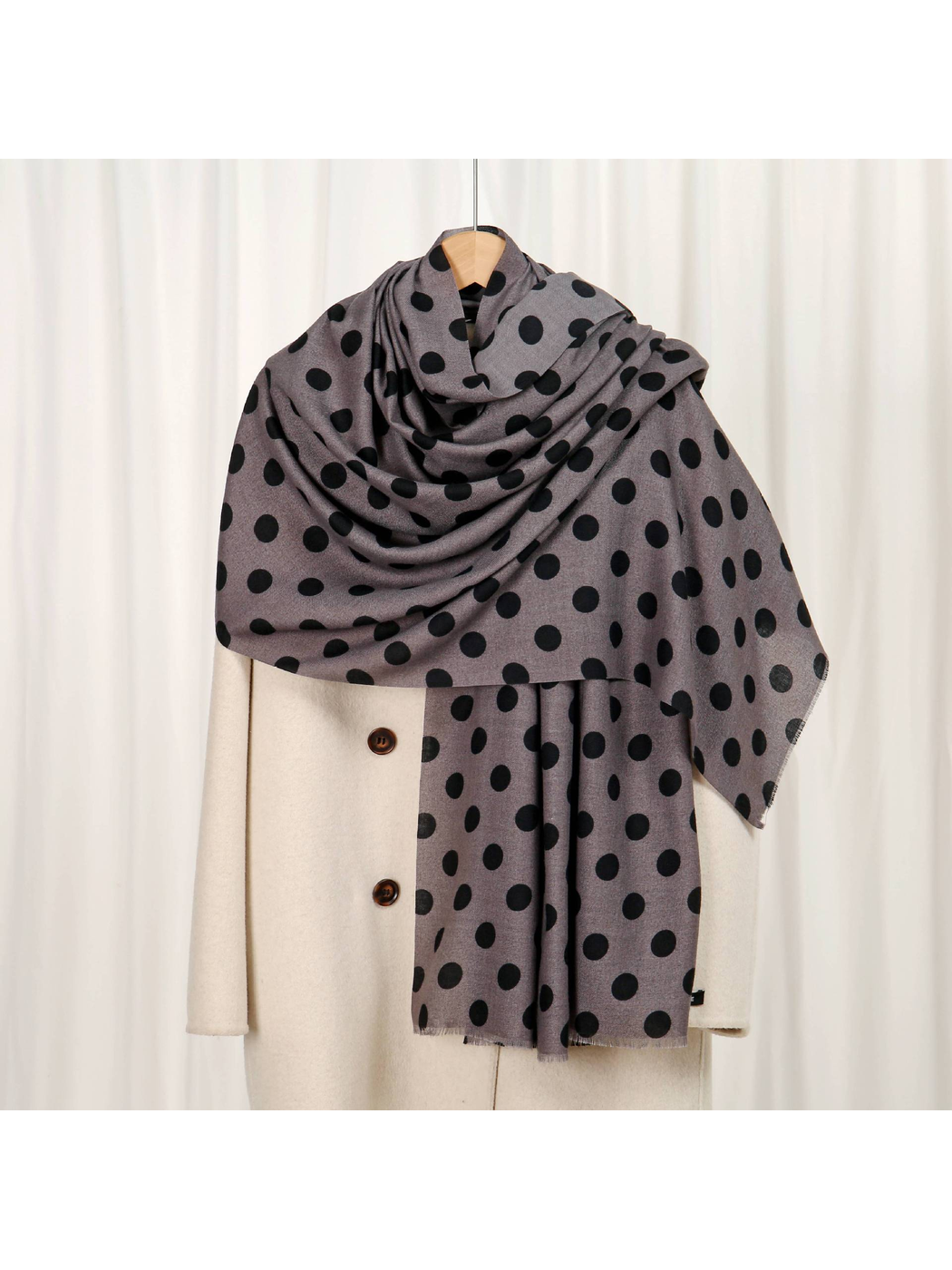 Gray scarf with black polka dots, draped front view