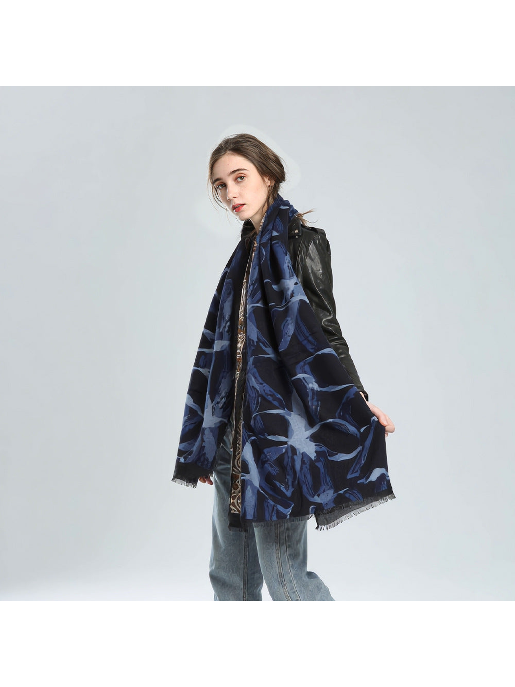 Navy abstract-print scarf styled with a black jacket