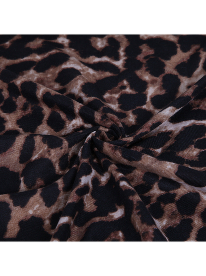 Close-up of the brown and black abstract leopard print and fluid folds
