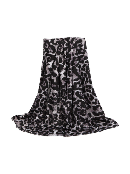 Black and gray abstract leopard-print scarf fully draped