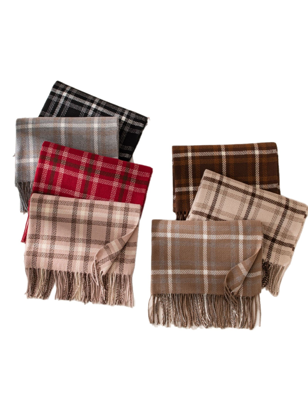 Seven plaid fringe scarves displayed together on a white background