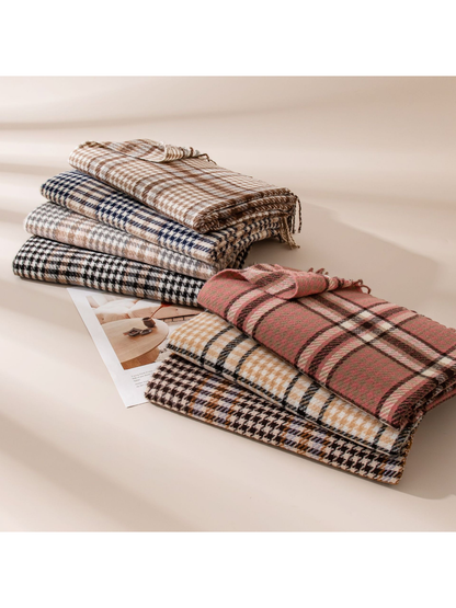 Assorted plaid fringed scarves stacked in two groups