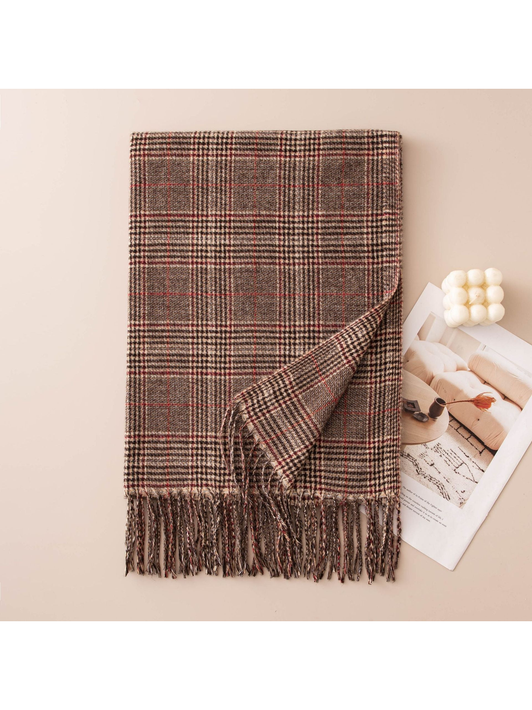 Dark brown plaid scarf with red accent lines and twisted fringe