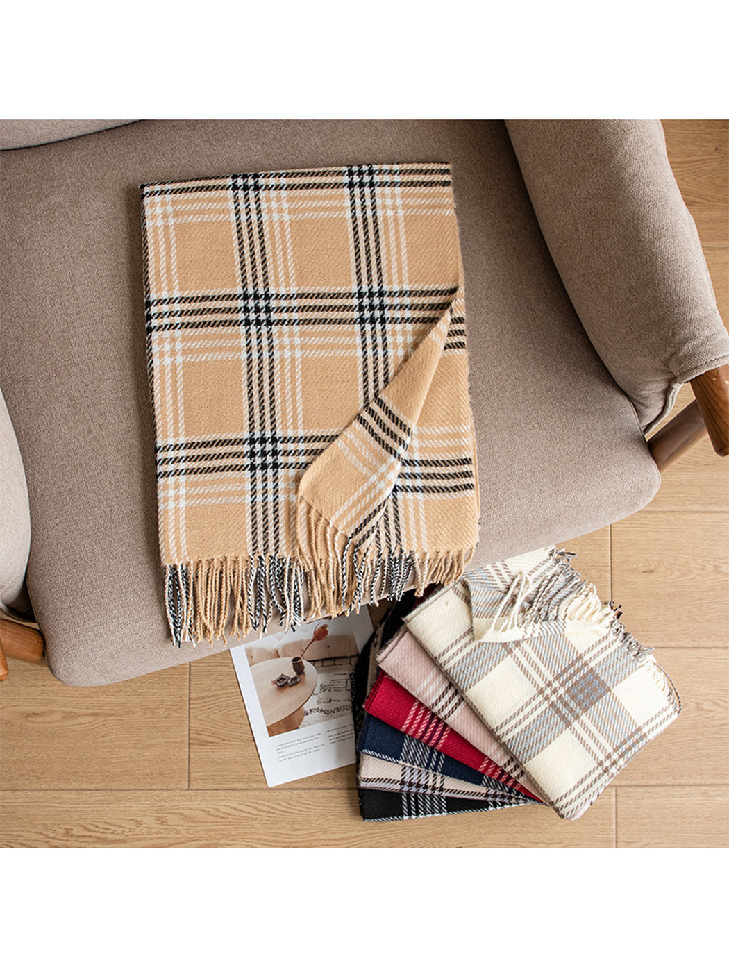 Camel plaid scarf displayed on an armchair beside stacked color options