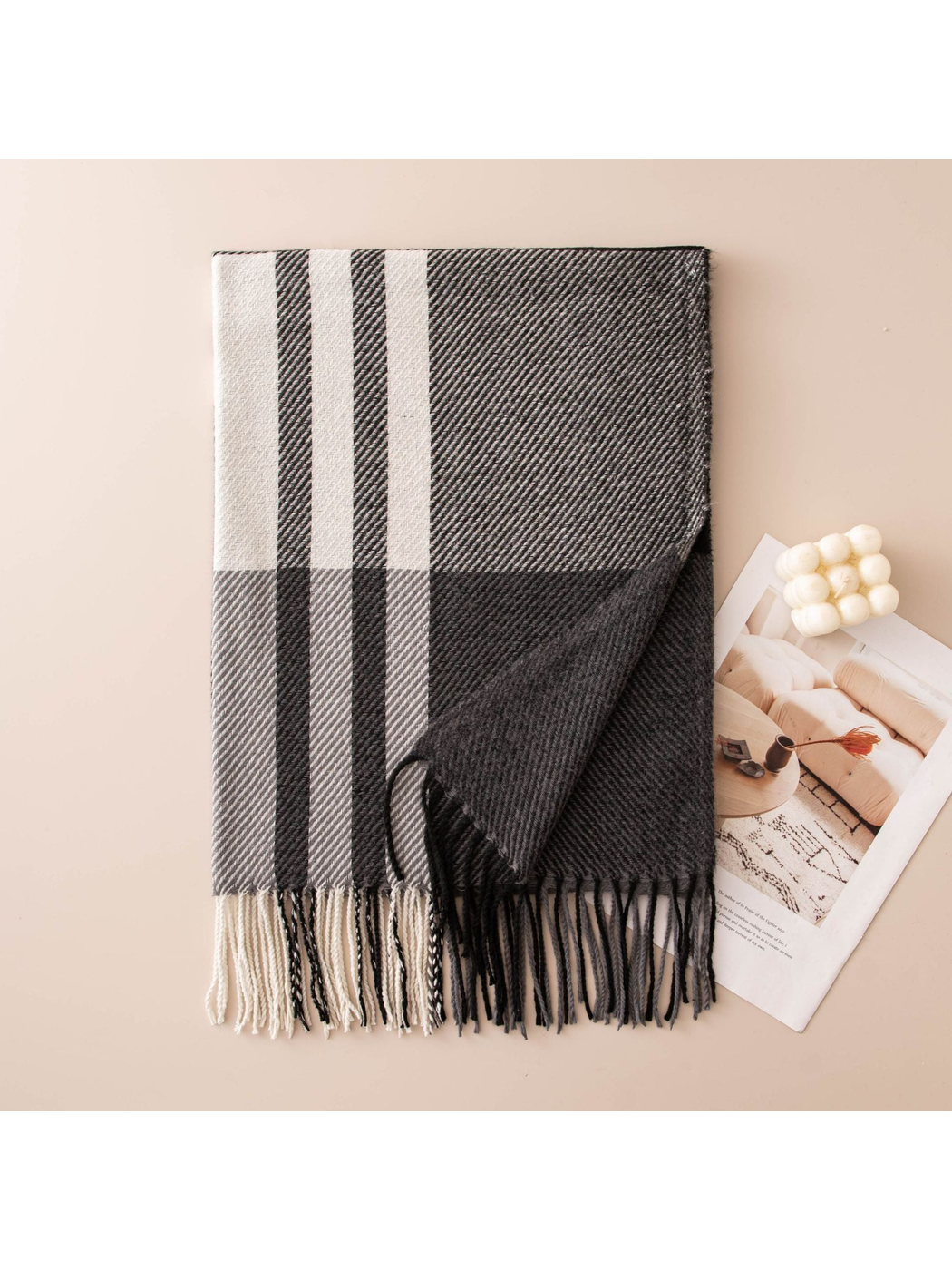 Black and gray plaid scarf with contrasting stripes and fringe