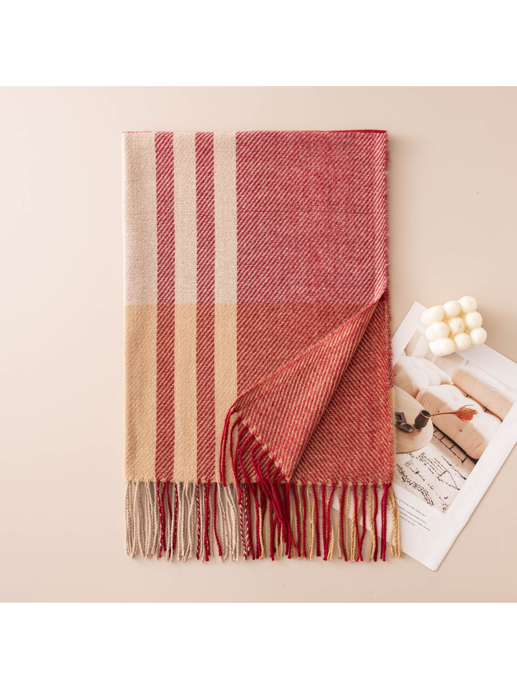 Red and beige plaid scarf with contrasting stripes and fringe