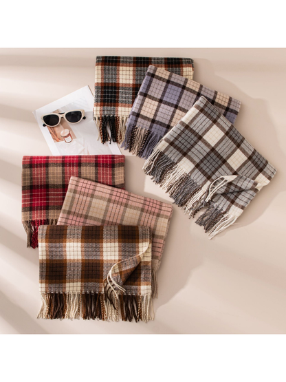 Six plaid fringed scarves arranged together in assorted colors