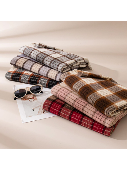 Assorted plaid scarves folded in two stacked arrangements